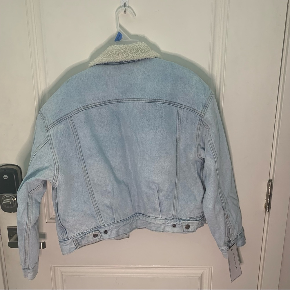 A warm jean jacket for the cooler days come. NWT the size is a small. - Picture 2 of 3